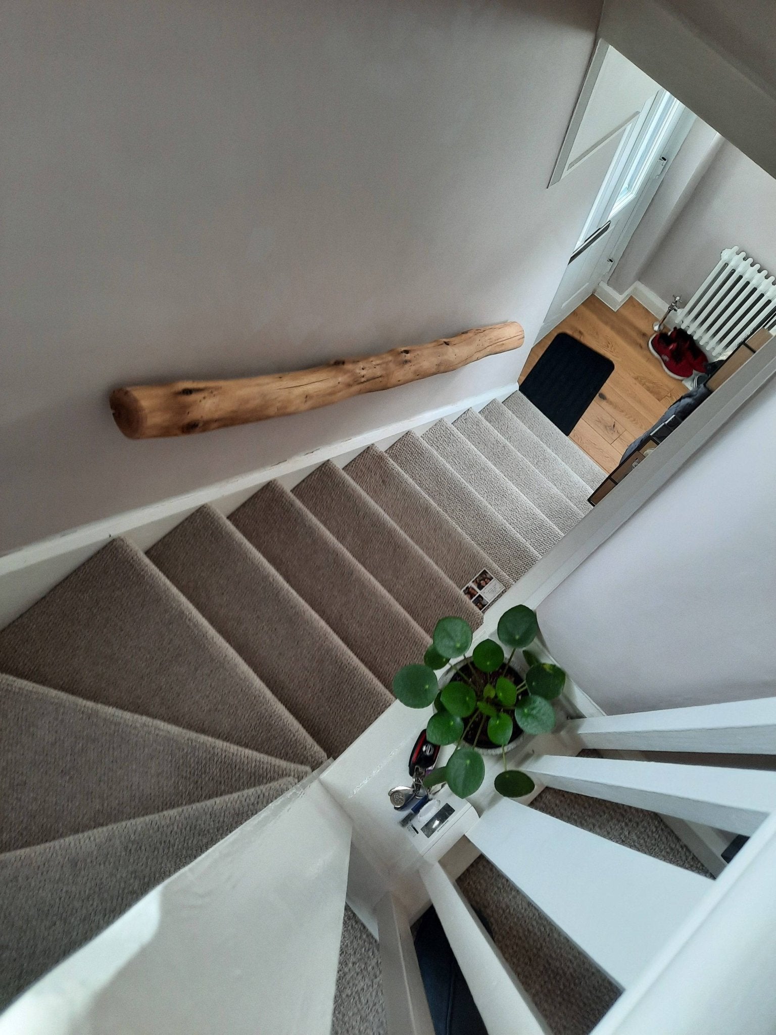 Individually made driftwood stair rail with organic natural curves — bespoke handrail, Wales
