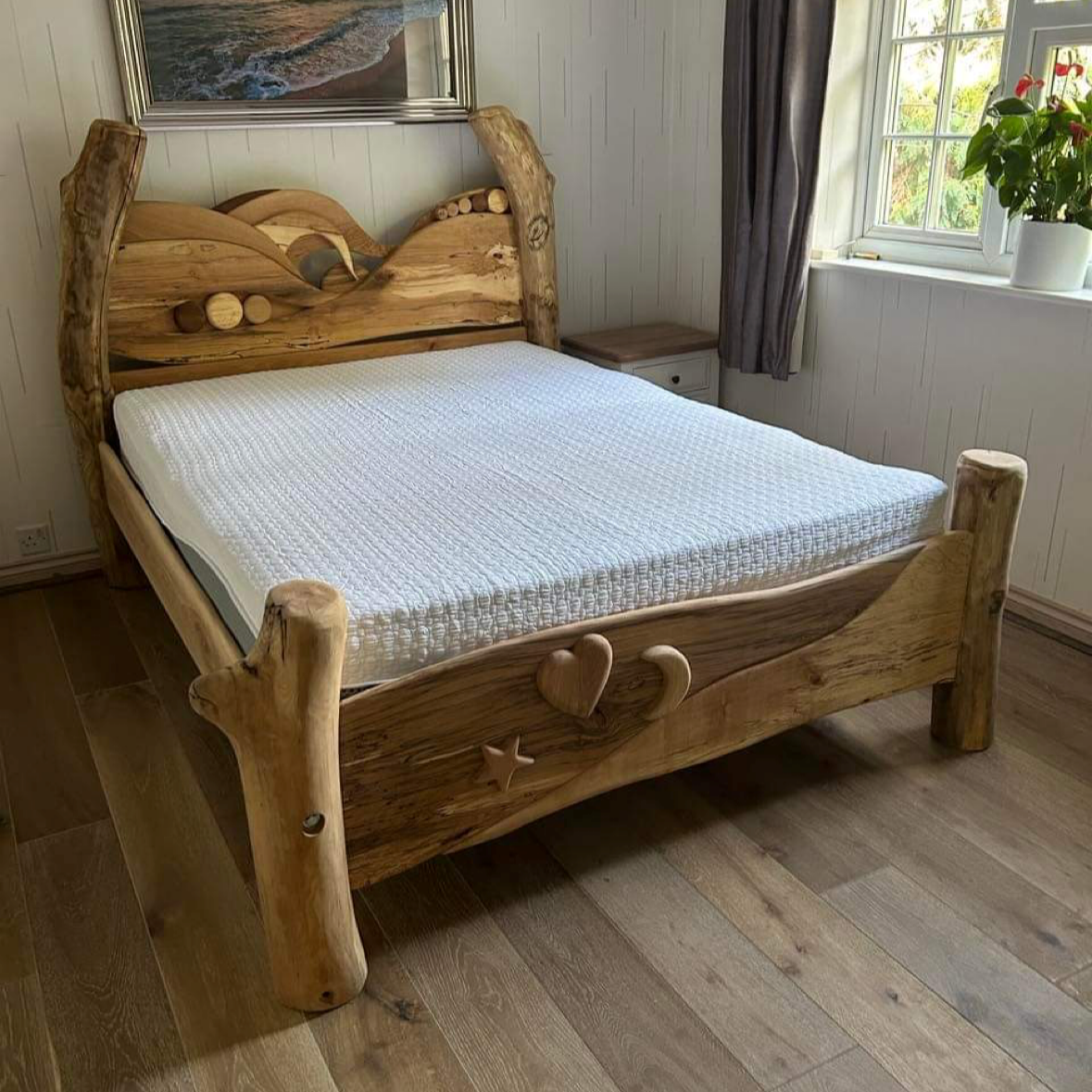 Hand-carved Driftwood Wave Bed Frame with spalted beech backboard and bespoke design, showcasing rustic charm and eco-friendly materials for a natural look.