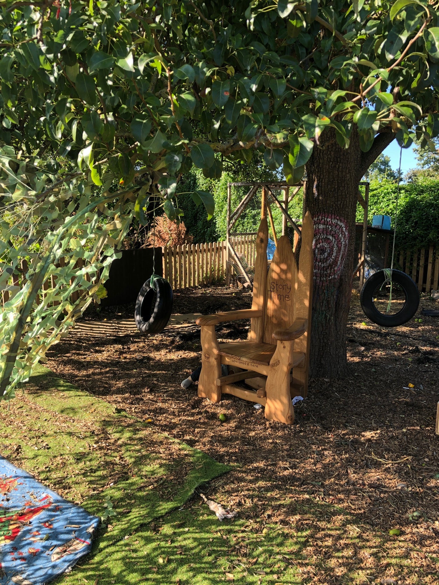 Elven story time chair in school playground — handcrafted oak reading throne, Wales