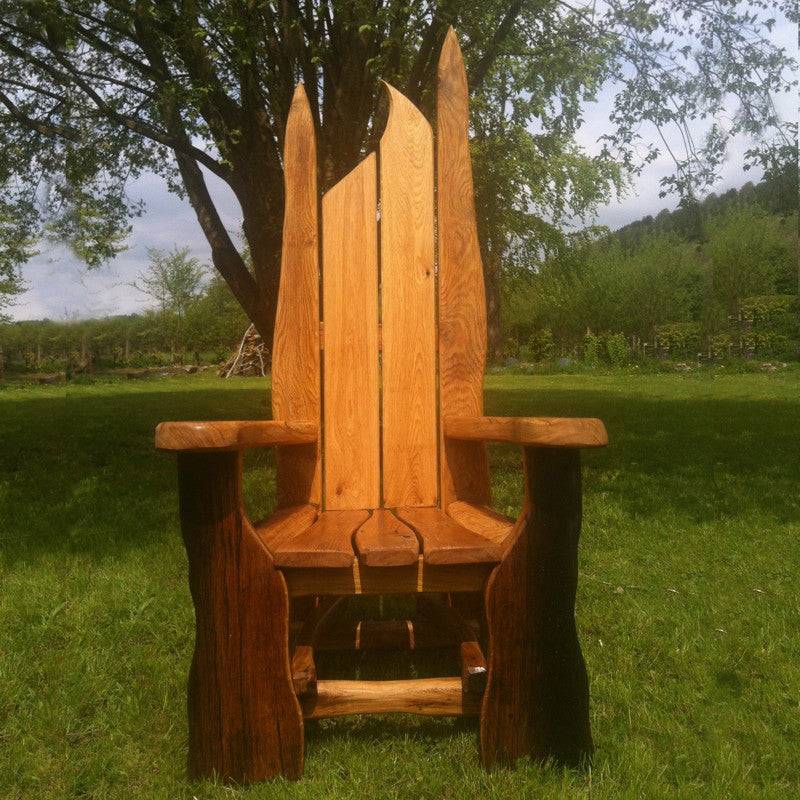 Side view of carved oak elven storytelling throne for schools — handmade in Wales