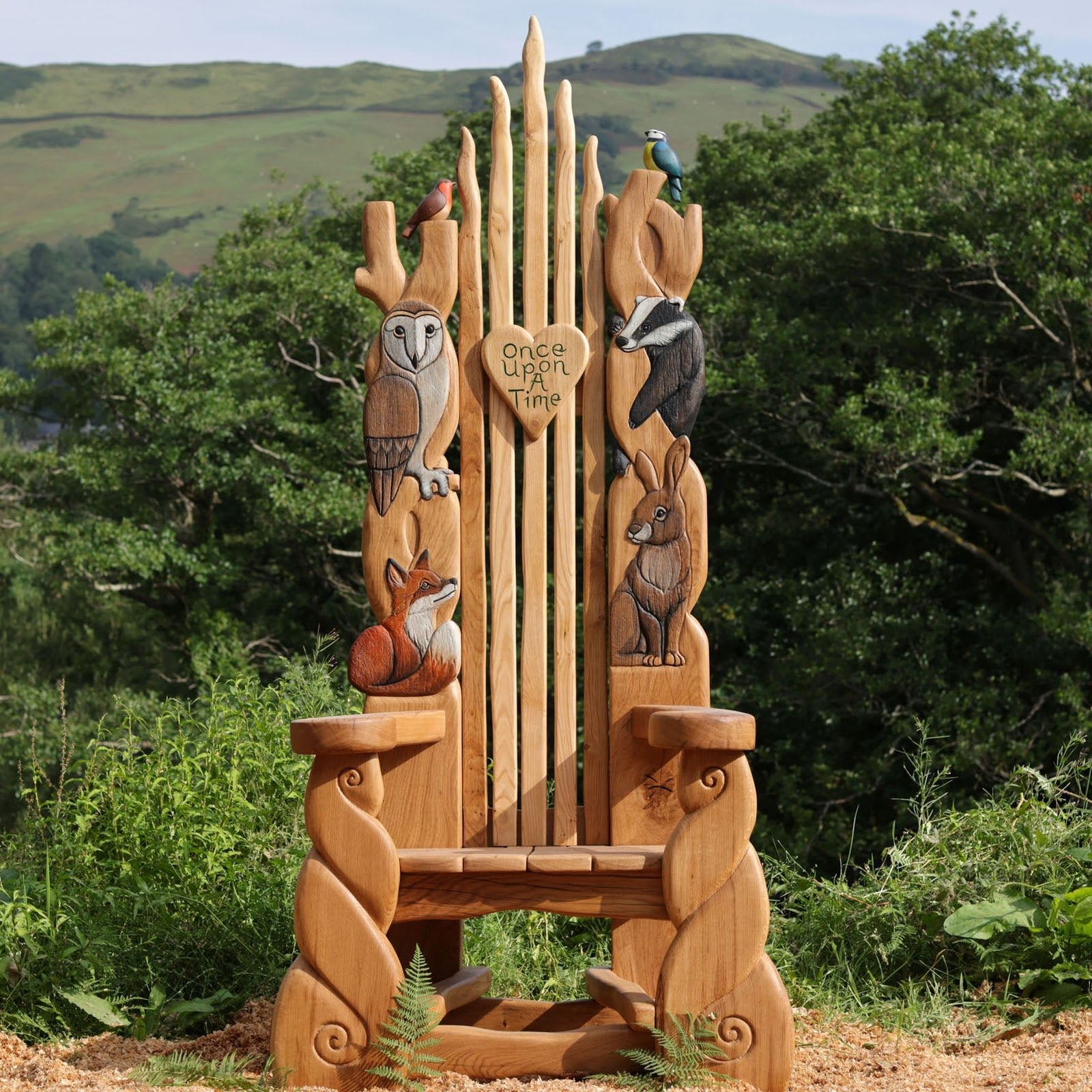 Handcrafted wooden throne with animal carvings