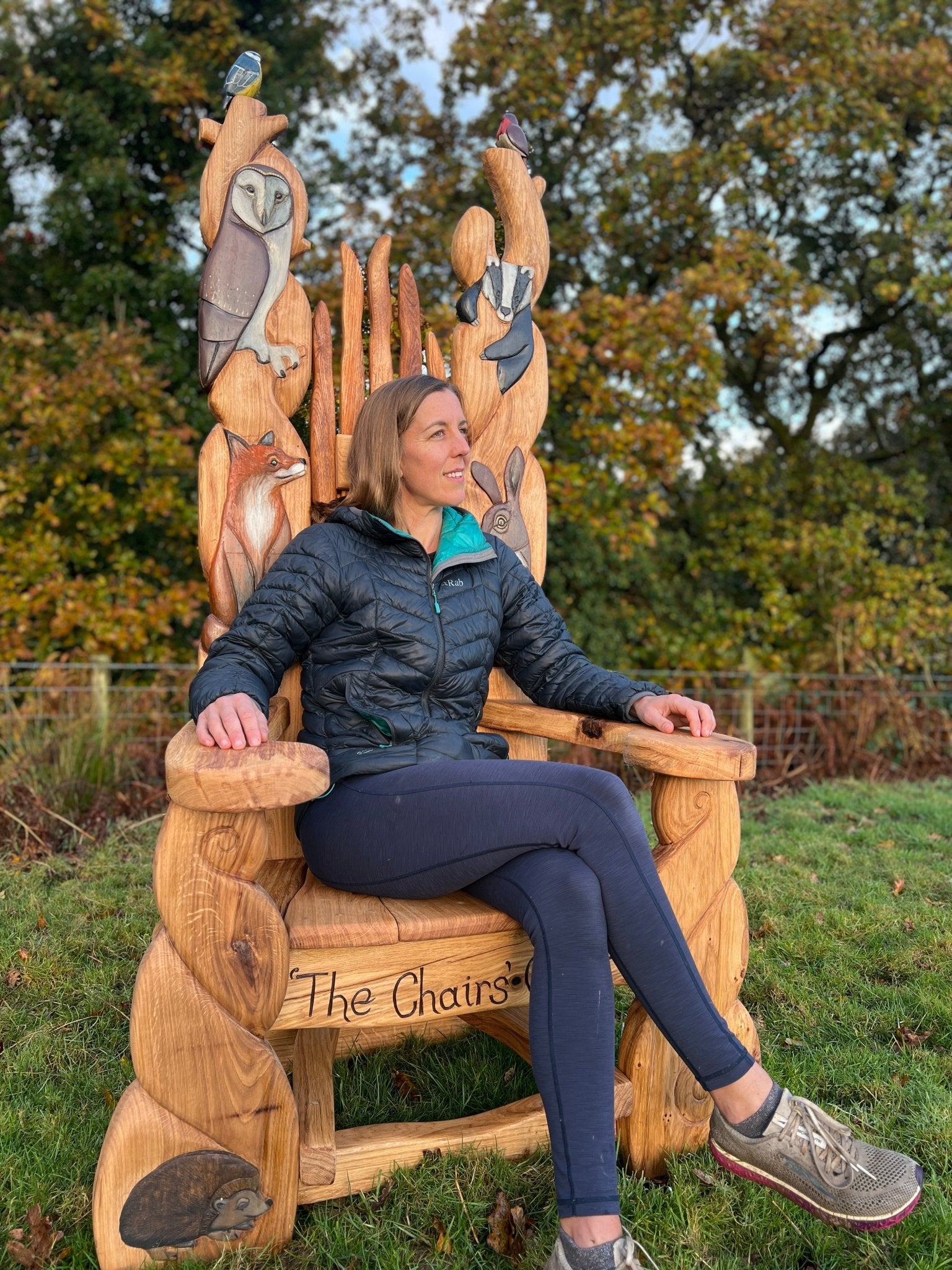 Carved animal throne storytelling chair in forest — handcrafted oak woodland reading throne, Wales