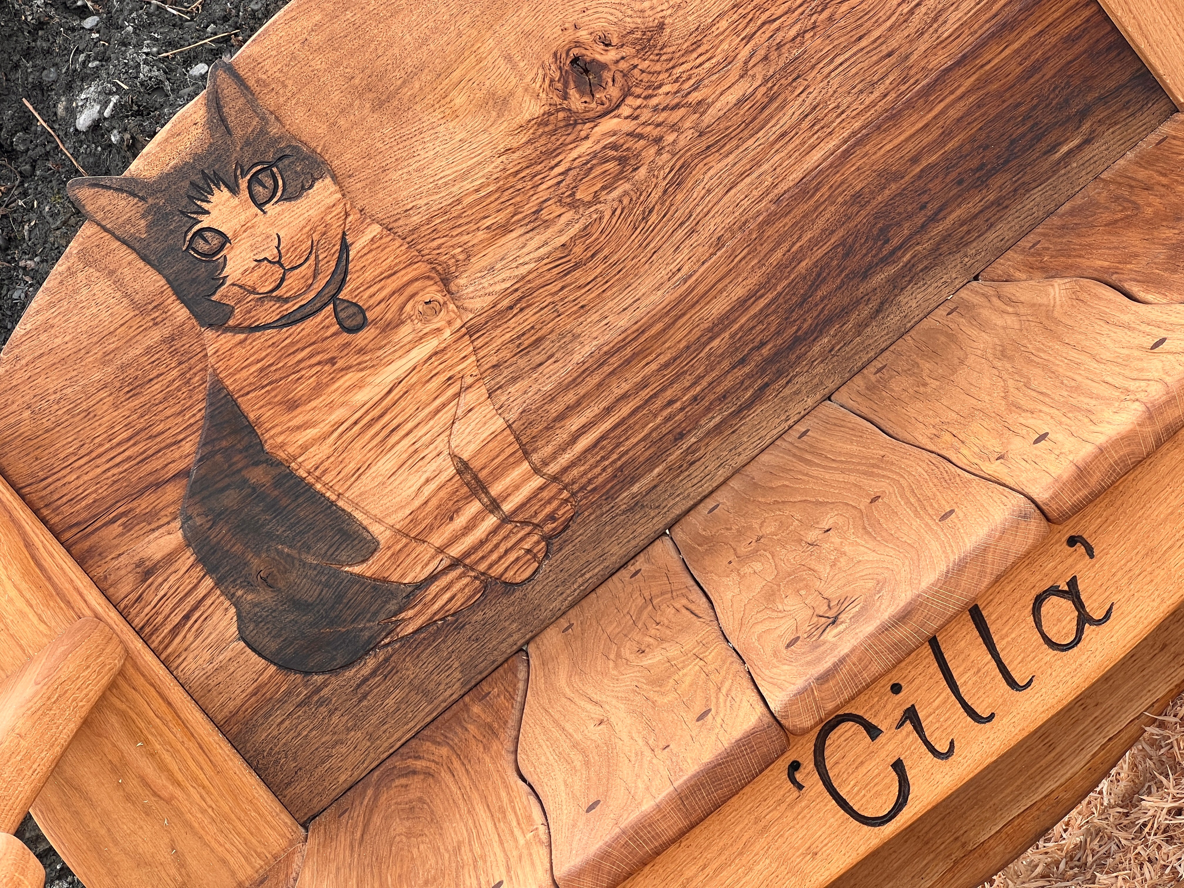 Personalised engraved wooden bench to commemorate a beloved school pet
