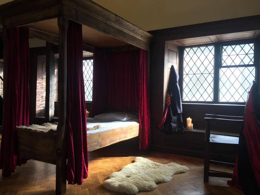 Solid oak Harry Potter single bed with carved magical details — handmade fantasy children's bed, Wales