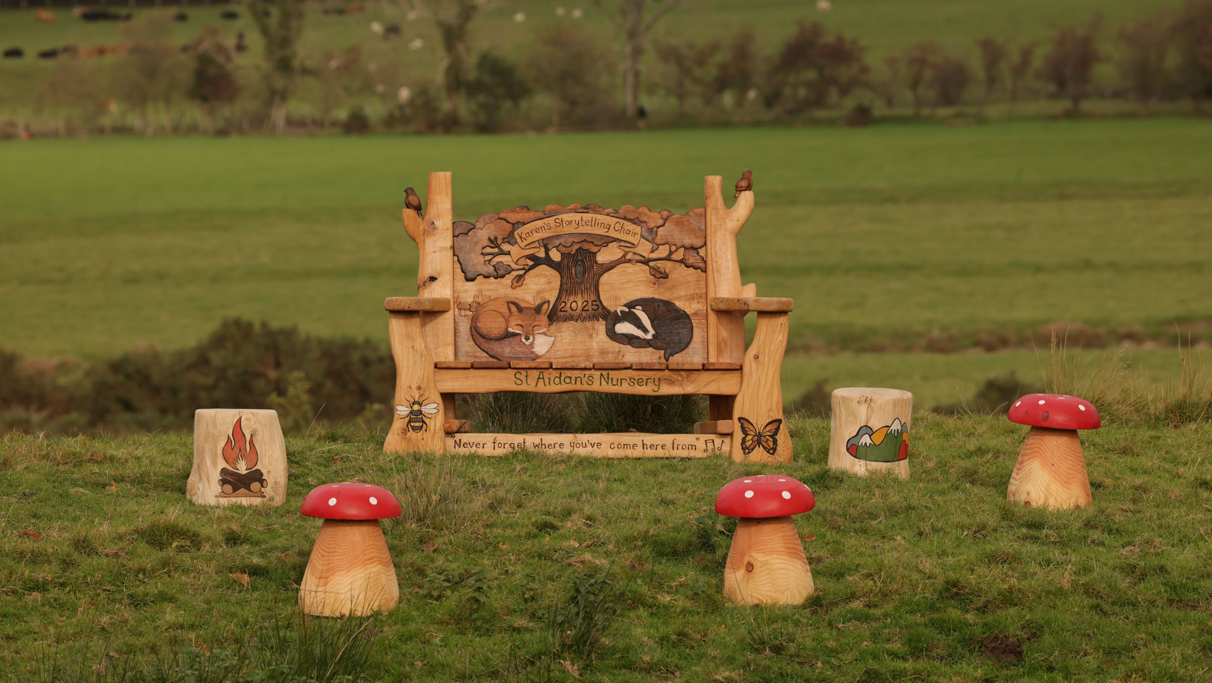 storytelling chair with red toadstools in school garden setting