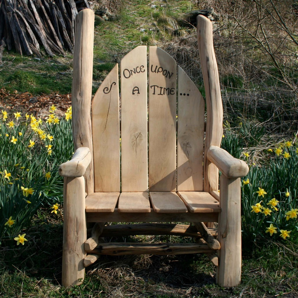 Handcrafted solid oak Friendship Bench featuring custom engravings and robust design, ideal for gardens and playgrounds.