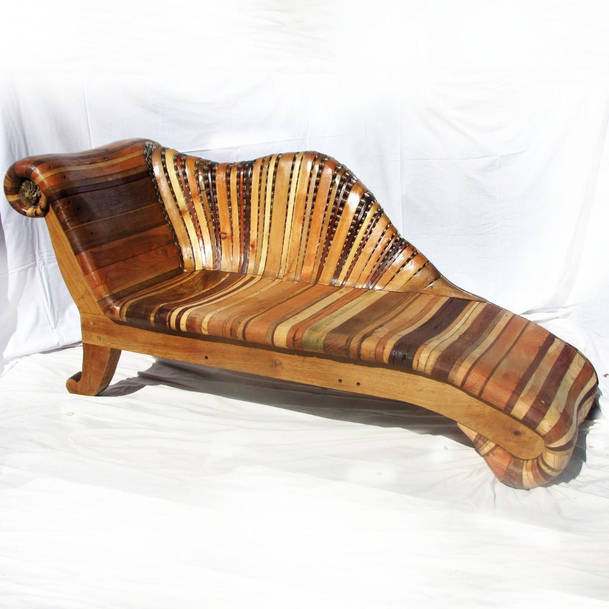 Handcrafted funky chaise longue in rustic oak and driftwood — bespoke furniture, Wales
