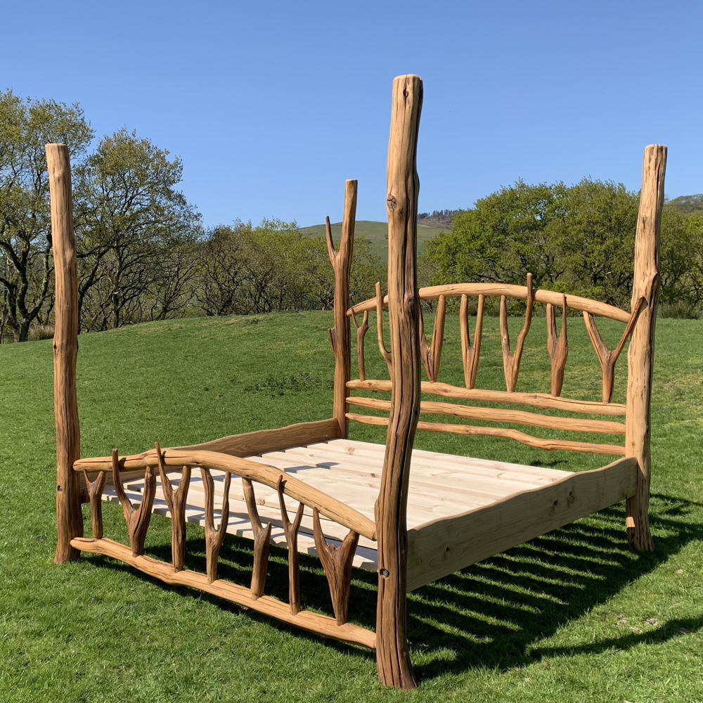 Rustic Funky Oak Four Poster Bed featuring forked branch headboard and tailboard, handcrafted from solid oak, perfect for a nature-inspired bedroom design.