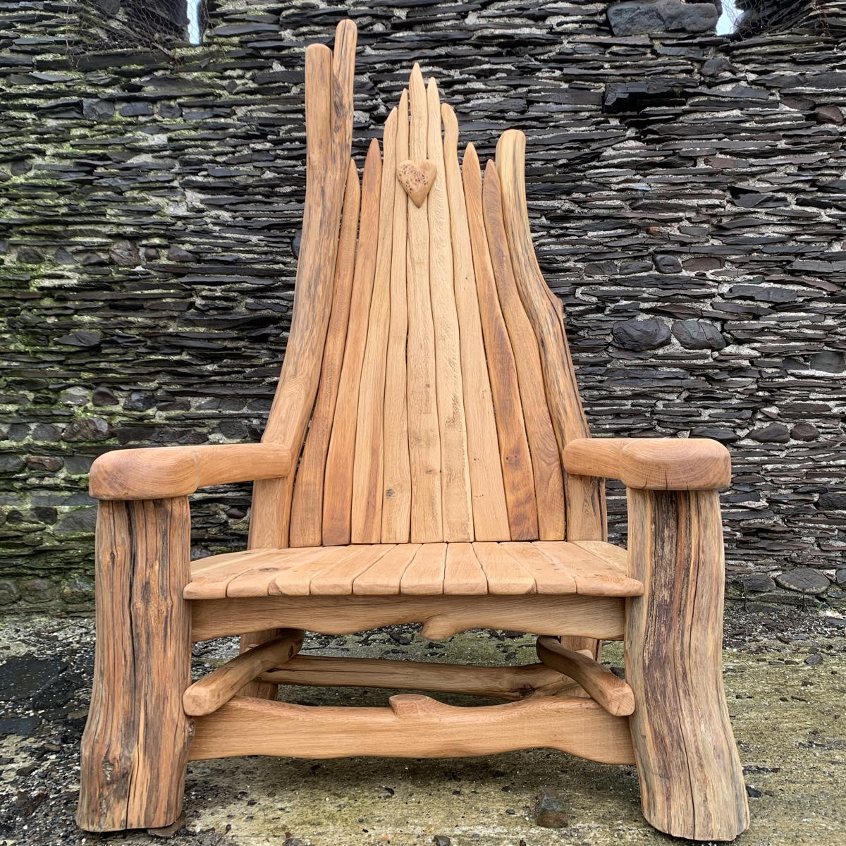 Handcrafted Giant Oak Chair Bench made from solid oak, designed for outdoor use and built to withstand all seasons. Ideal as a garden bench or statement seat.

