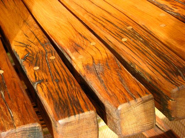 Close-up detail of handcrafted giant oak storytelling chair — bespoke reading throne, Wales