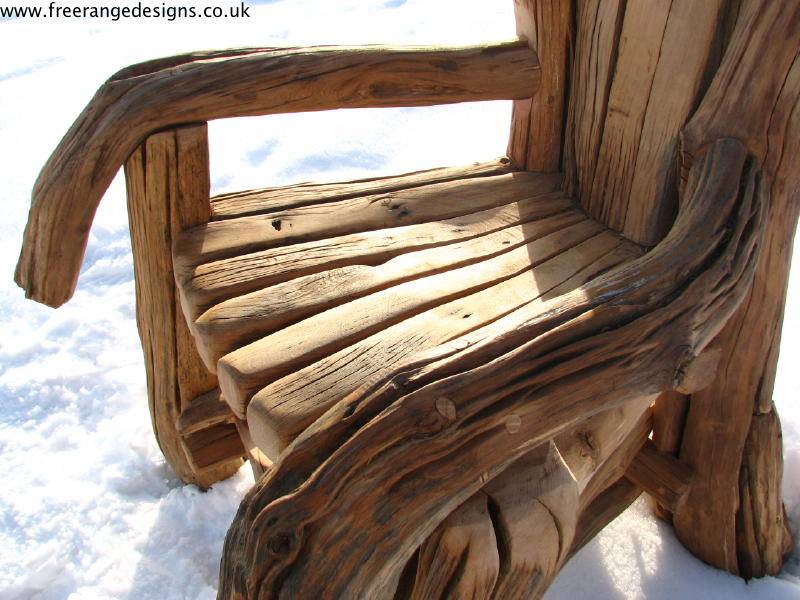 Close-up of giant handcrafted oak storytelling chair — bespoke carved reading throne, Wales