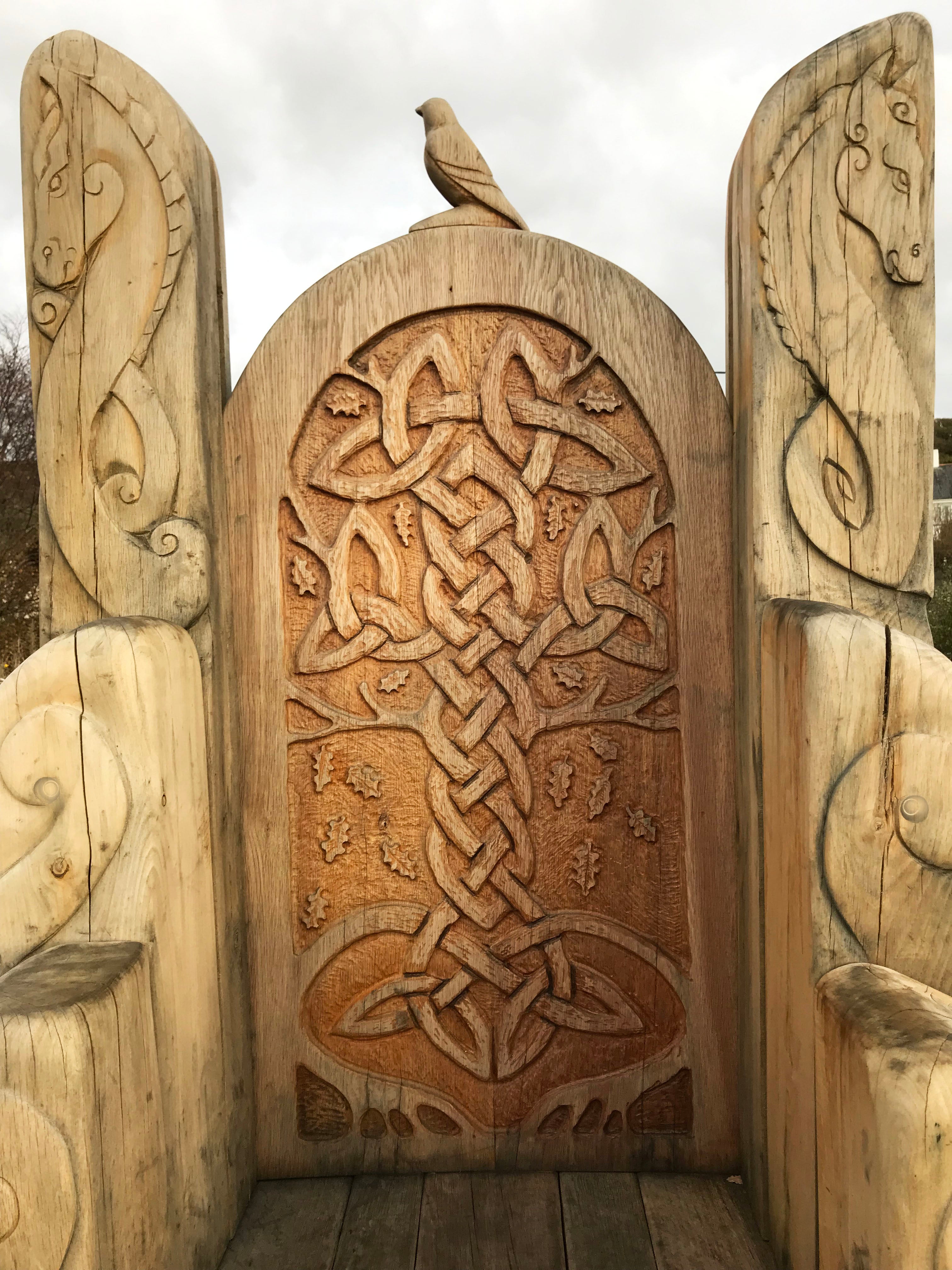 Close-up of Celtic carvings on wooden chair