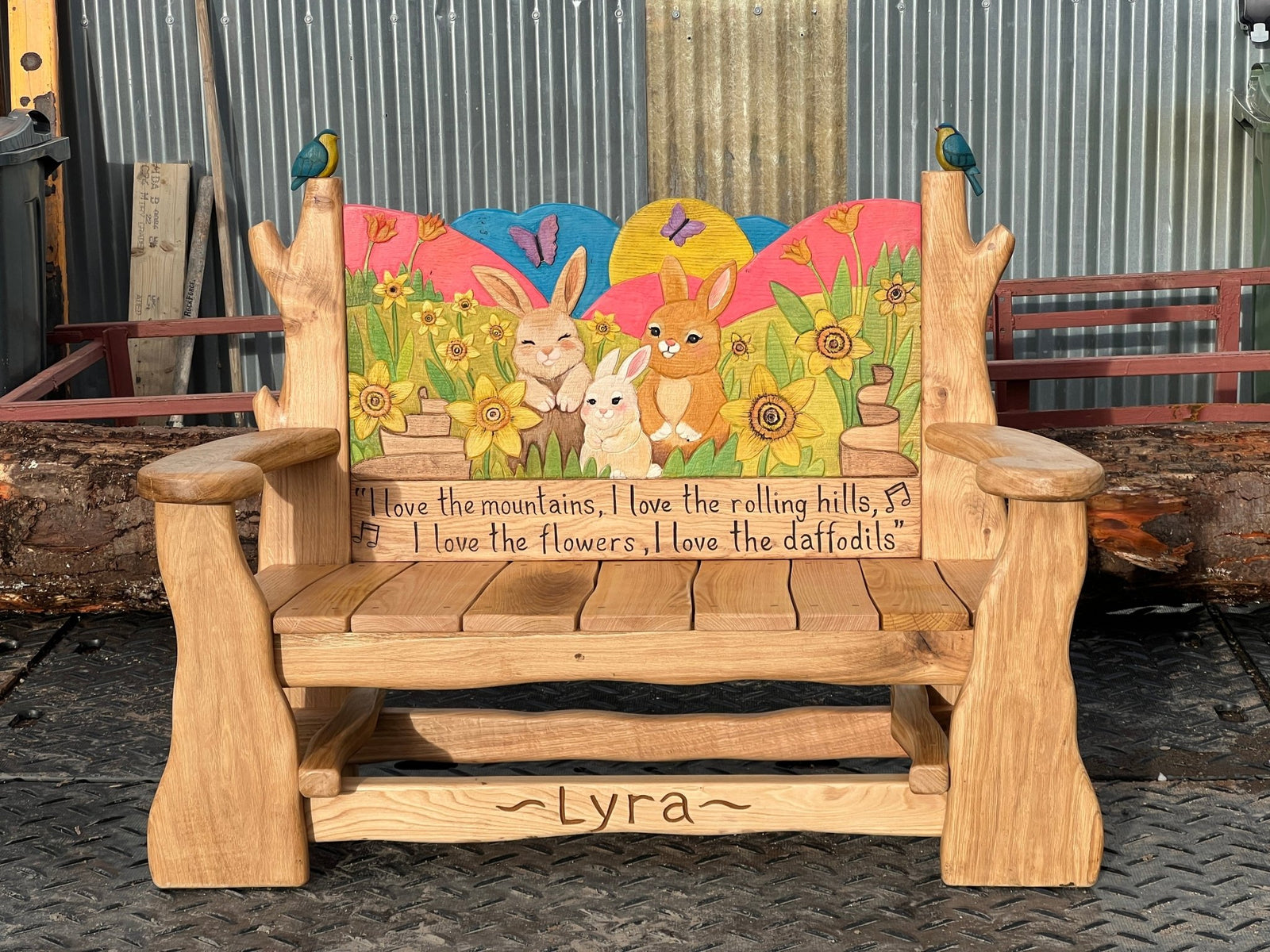 "Personalised name engraving on handcrafted oak memorial bench – custom memorial furniture made in Wales."