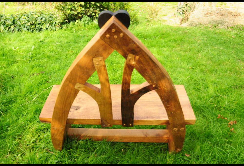 Handmade ceremonial oak bench from rear — heart design, bespoke, Wales
