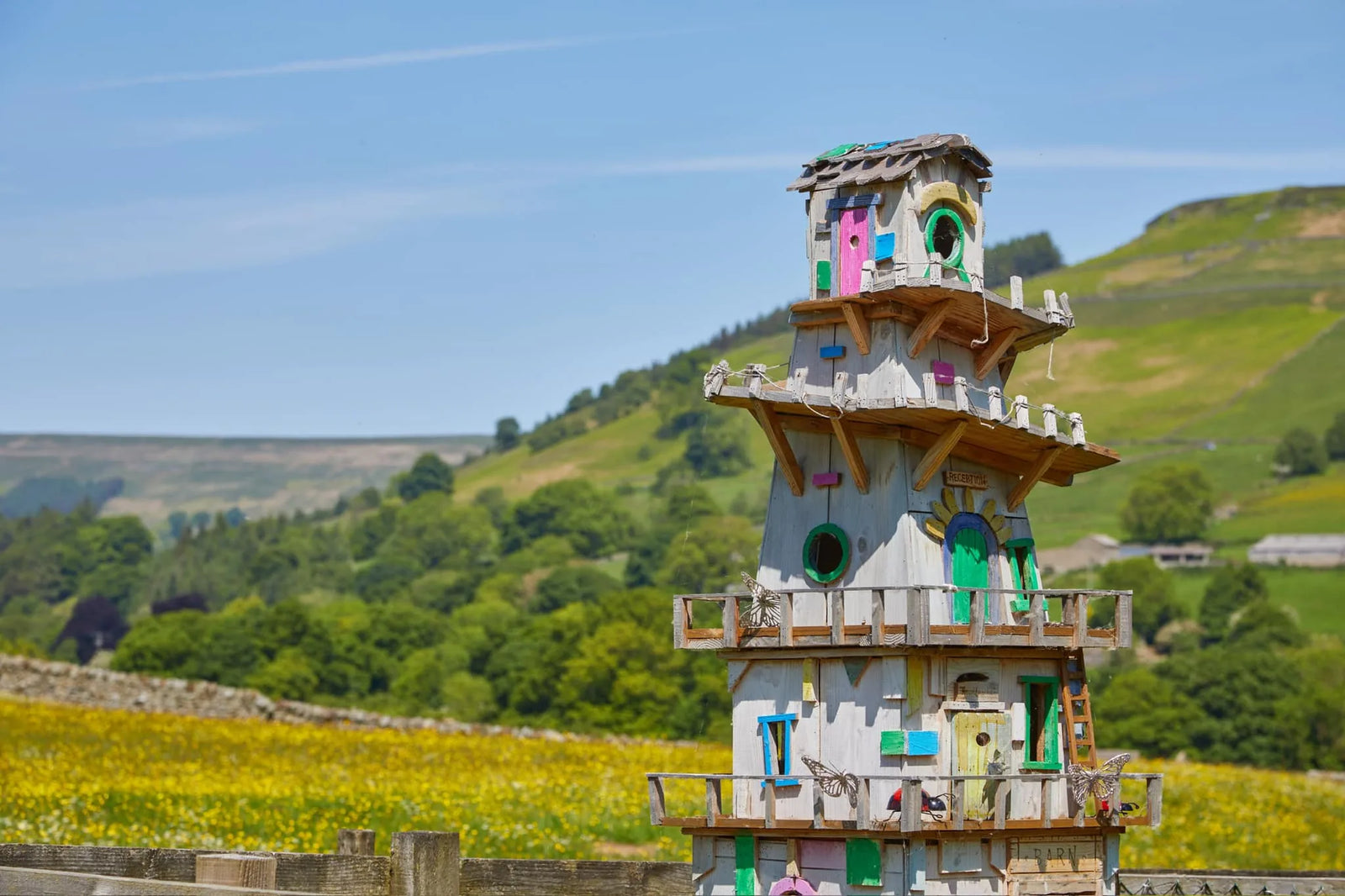 Close-up of helter skelter fairy house middle section with hand-painted funfair patterns