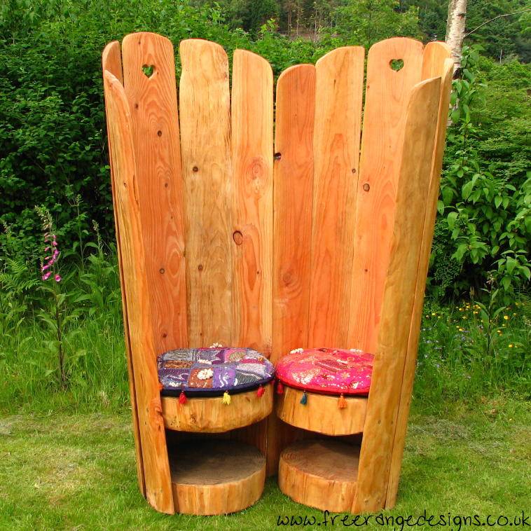 Paired carved oak love seat kissing chairs — handmade garden furniture, Wales