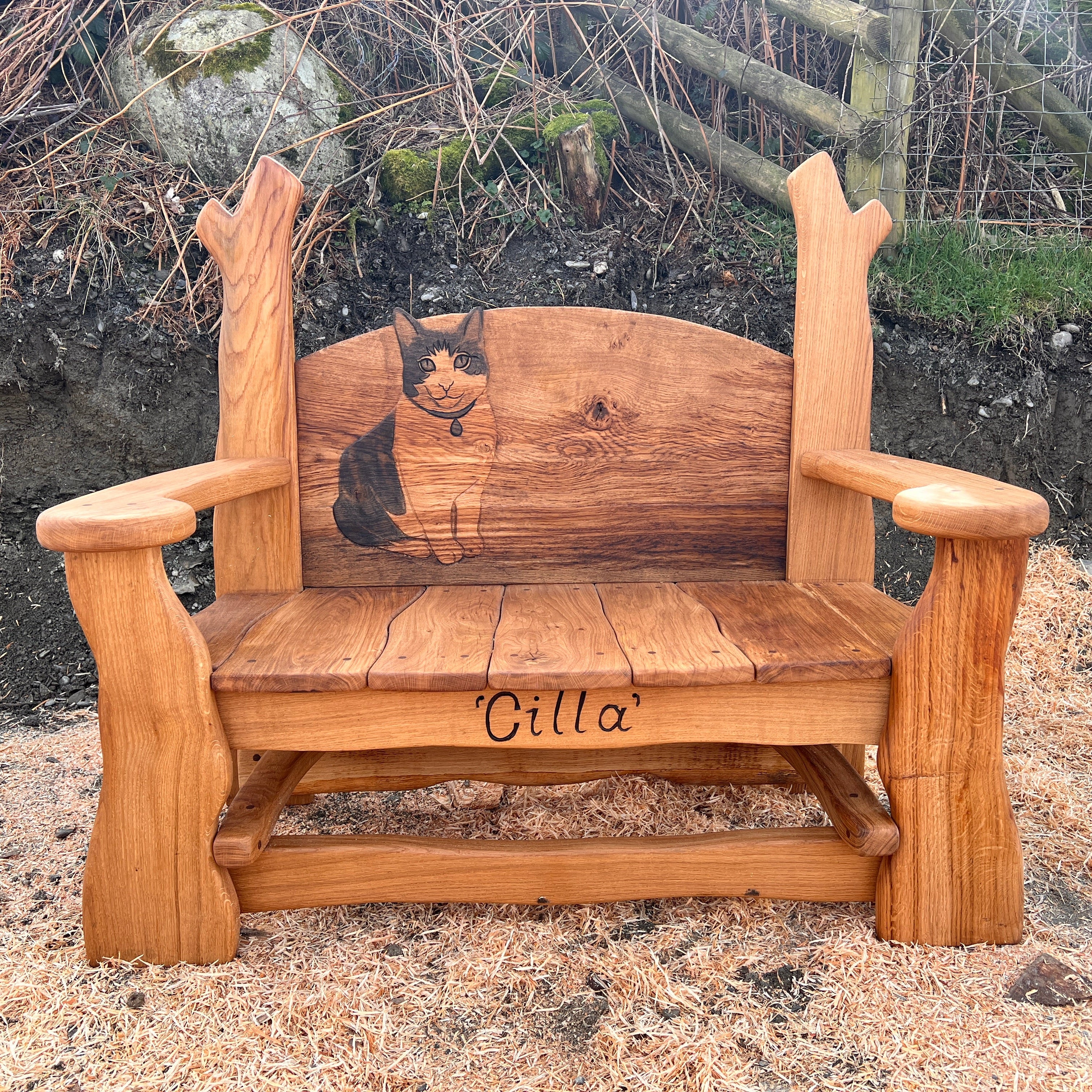 Handmade wooden memorial bench with engraved cat portrait in honour of Cilla