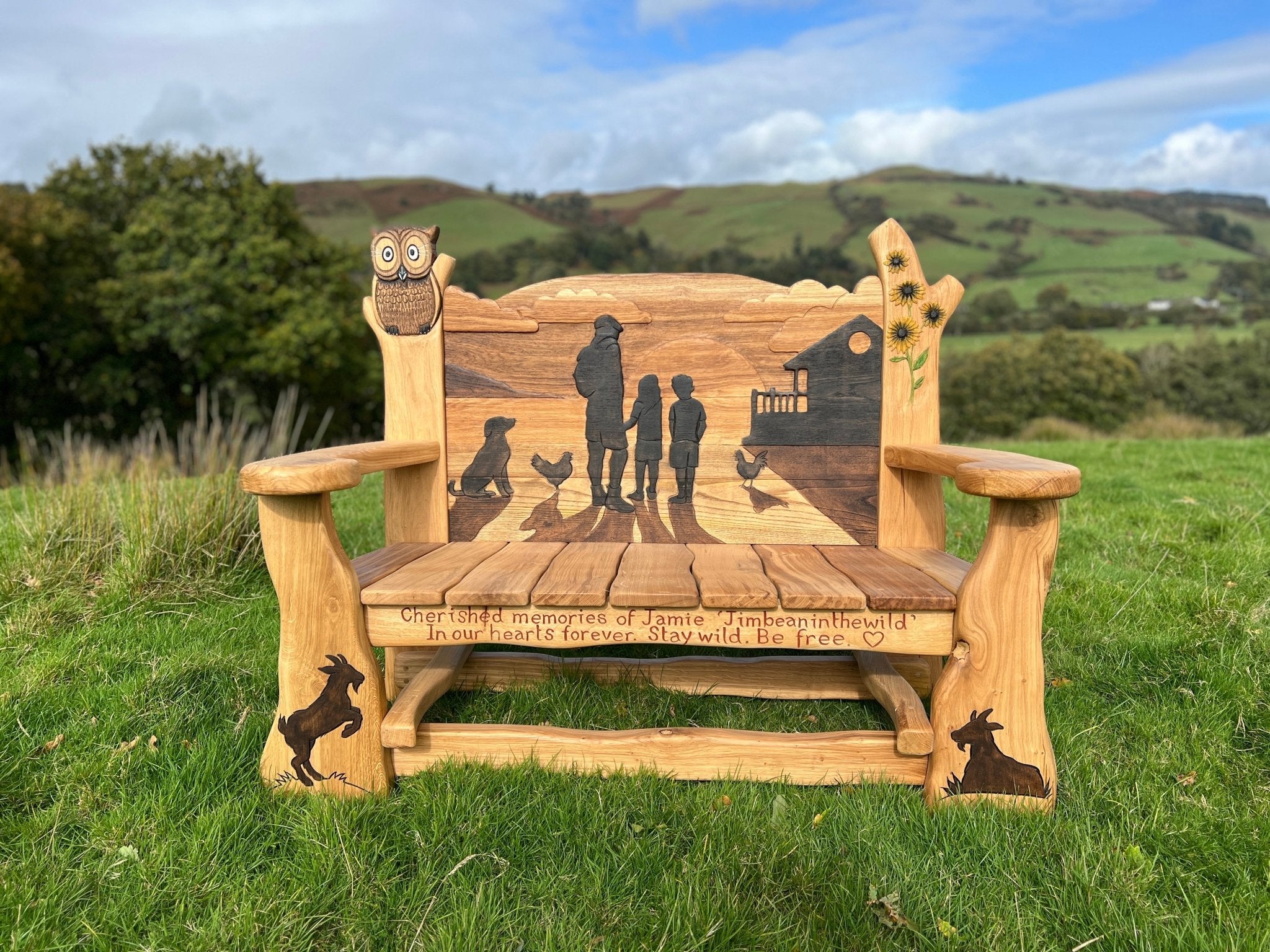 hand carved memorial bench with family silhouette scene made in wales