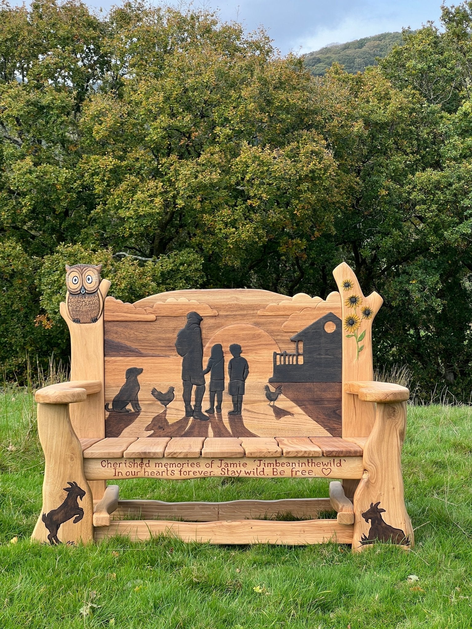 memorial bench for Jamie with carved enscription