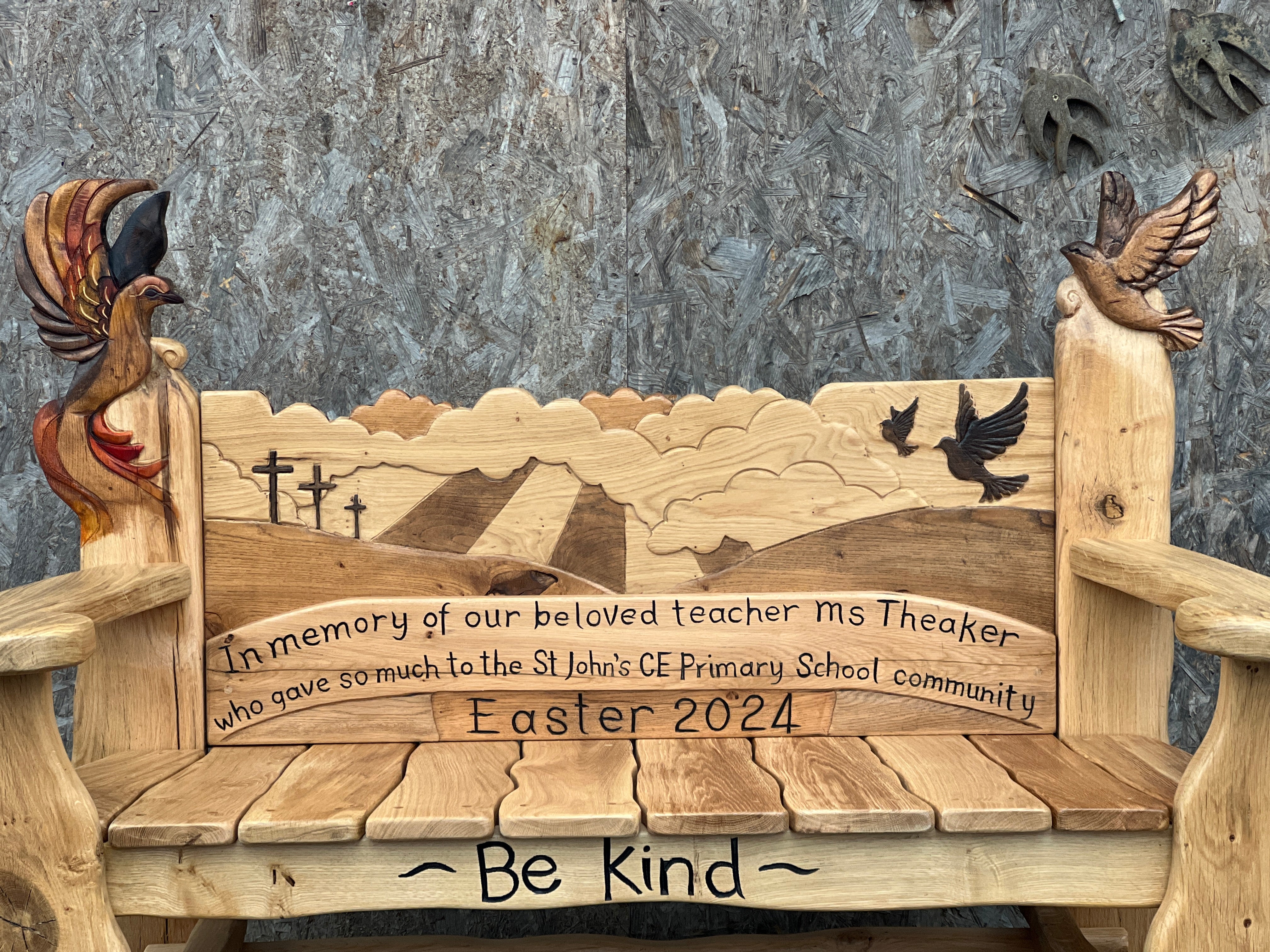 handcrafted remembrance bench with phoenix design