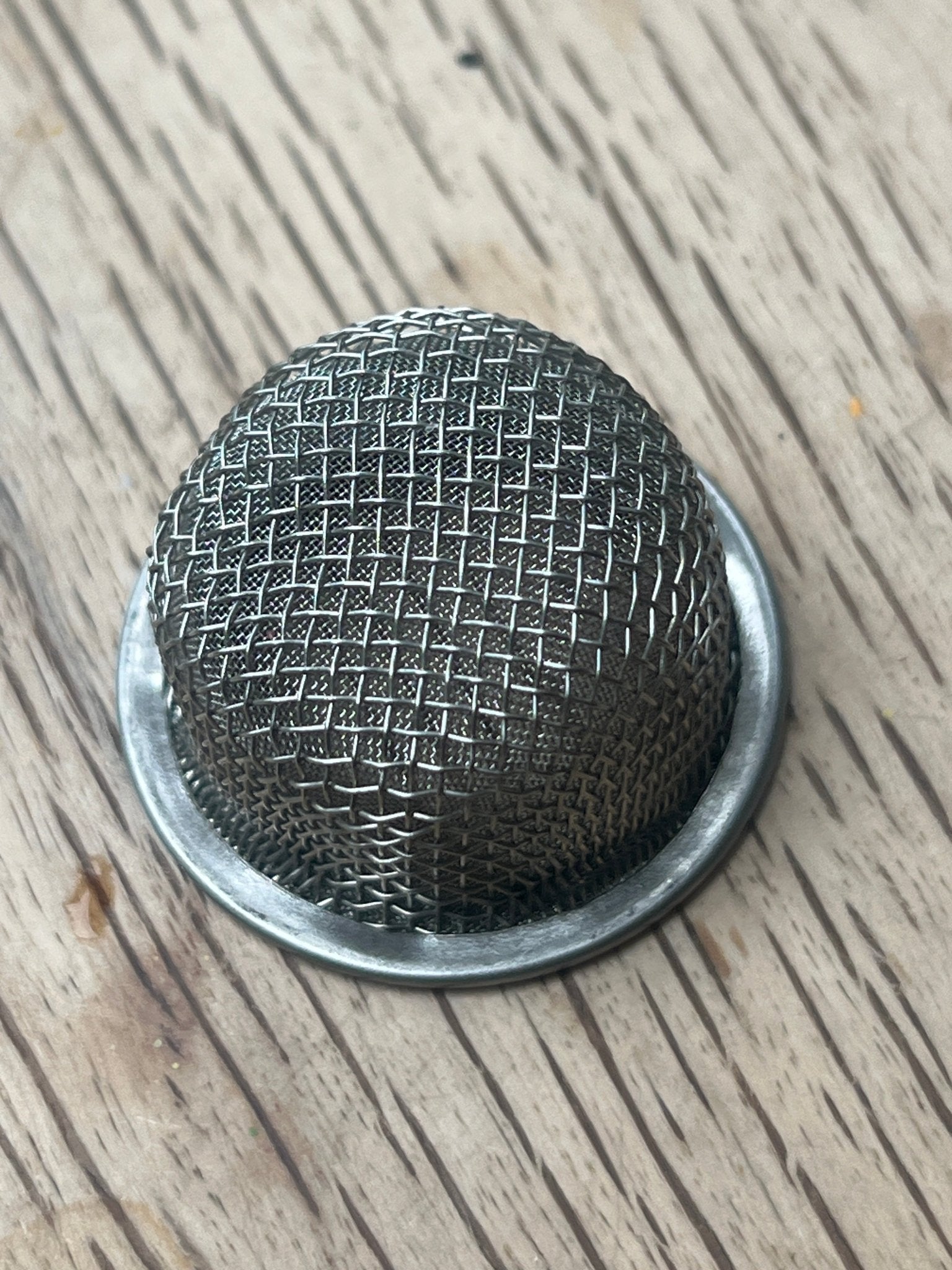 Metal mesh filter for composting toilet urine separator. - FreeRangeDesigns