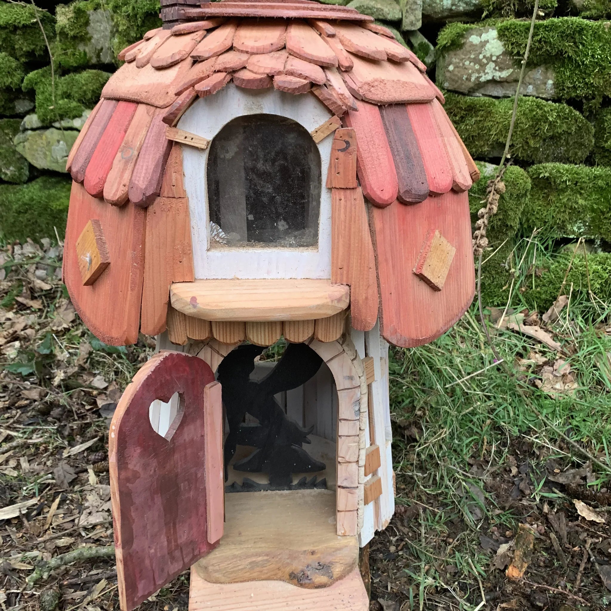 Handmade hexagonal mushroom fairy cottage with spotted toadstool cap roof and solid wooden base