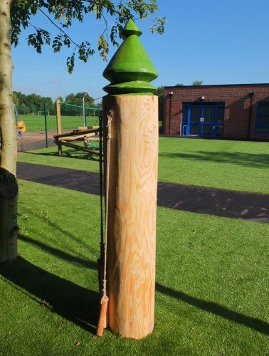 Outdoor oak log drum in school garden — handcrafted bespoke musical instrument, Wales