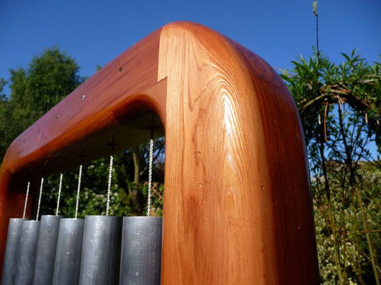 Outdoor tubular bells in school playground — handmade musical instrument for outdoor learning, Wales