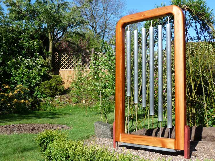 Handcrafted outdoor tubular bells — bespoke wooden musical instrument for schools, Wales