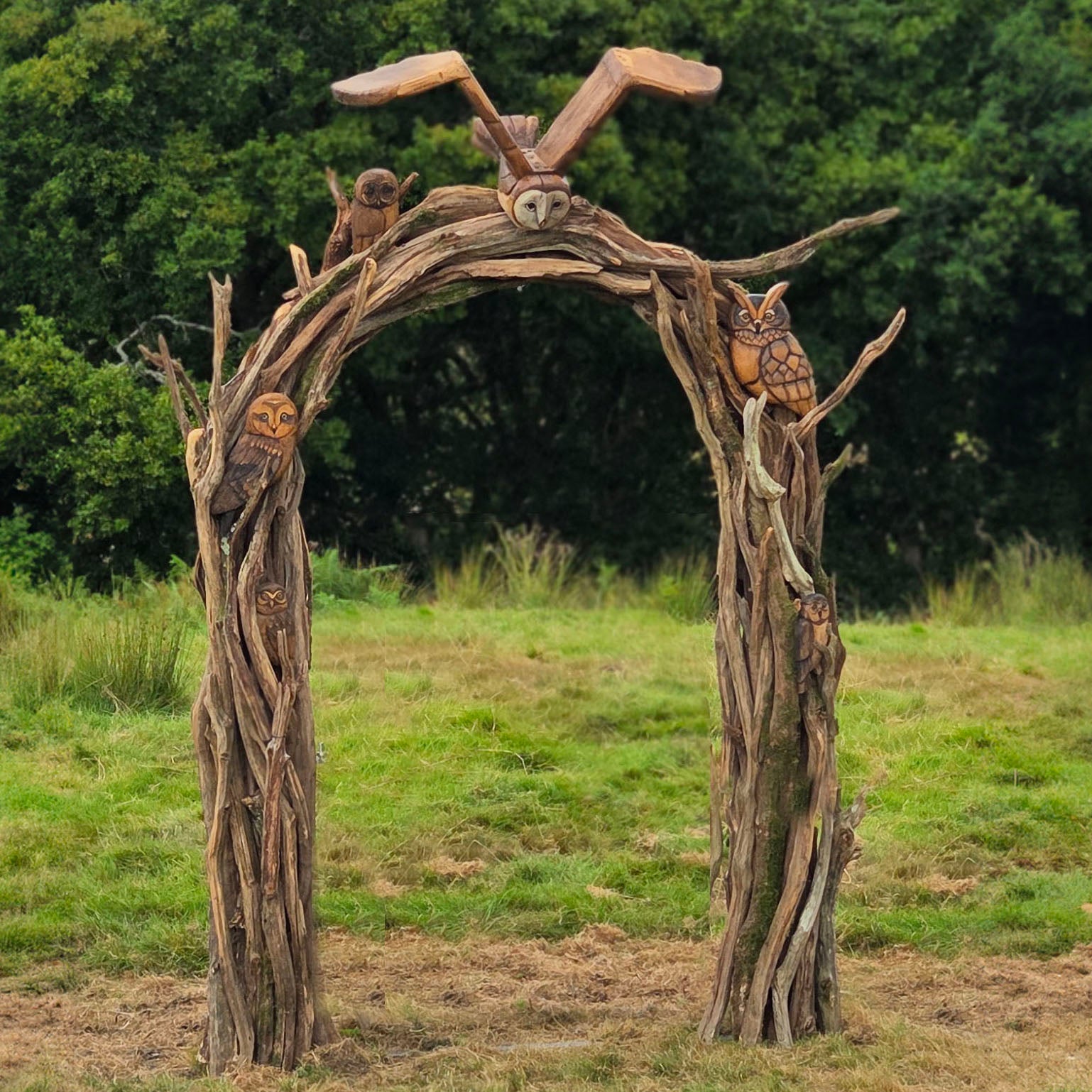 hand-carved oak owl arch