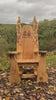oak throne chair with carved flowers and vines