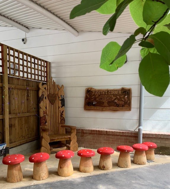 Red mushroom wooden stool — handmade carved fantasy garden furniture, Wales