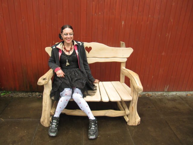 Solid oak rustic garden bench with heart motif — handmade bespoke outdoor seating, Wales