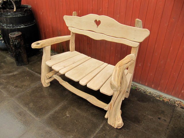 Rustic oak garden bench with carved heart — handmade bespoke outdoor seating, Wales