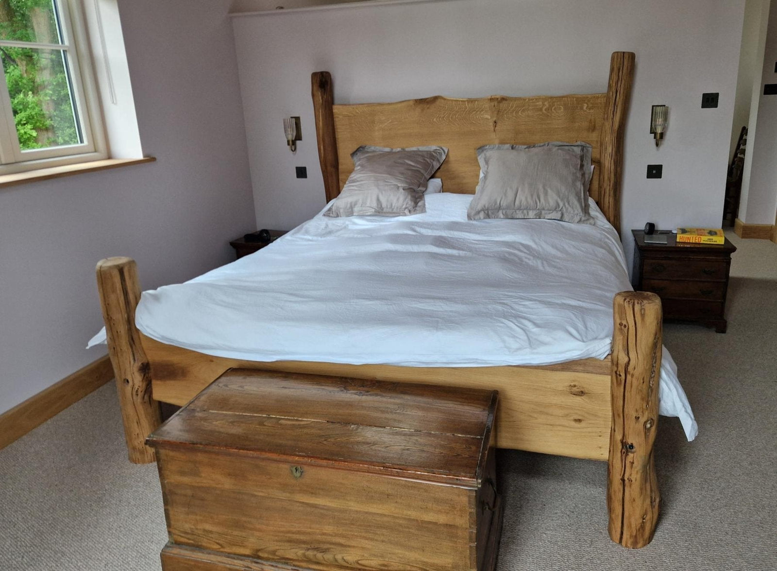 beautiful oak bed in new bedroom