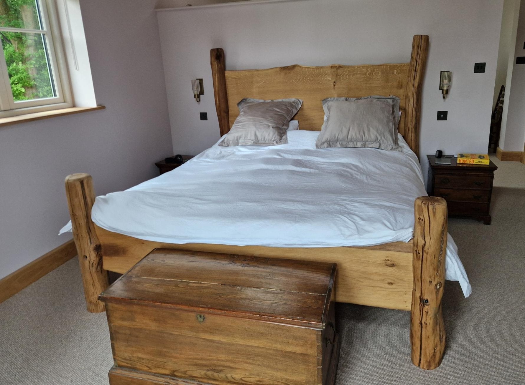 beautiful oak bed in new bedroom