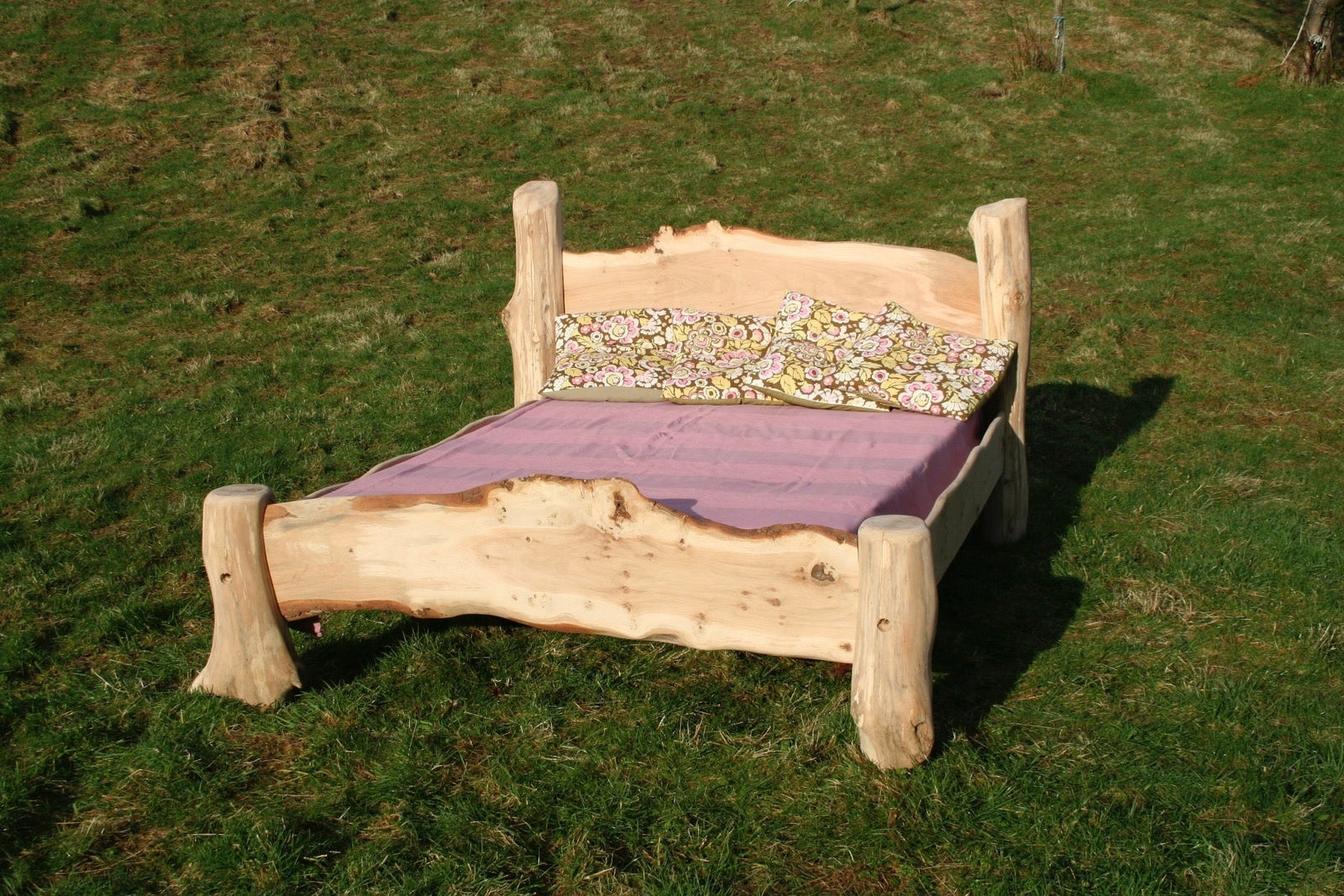 Rustic handmade oak driftwood bed frame — bespoke natural wood bedroom furniture, Wales