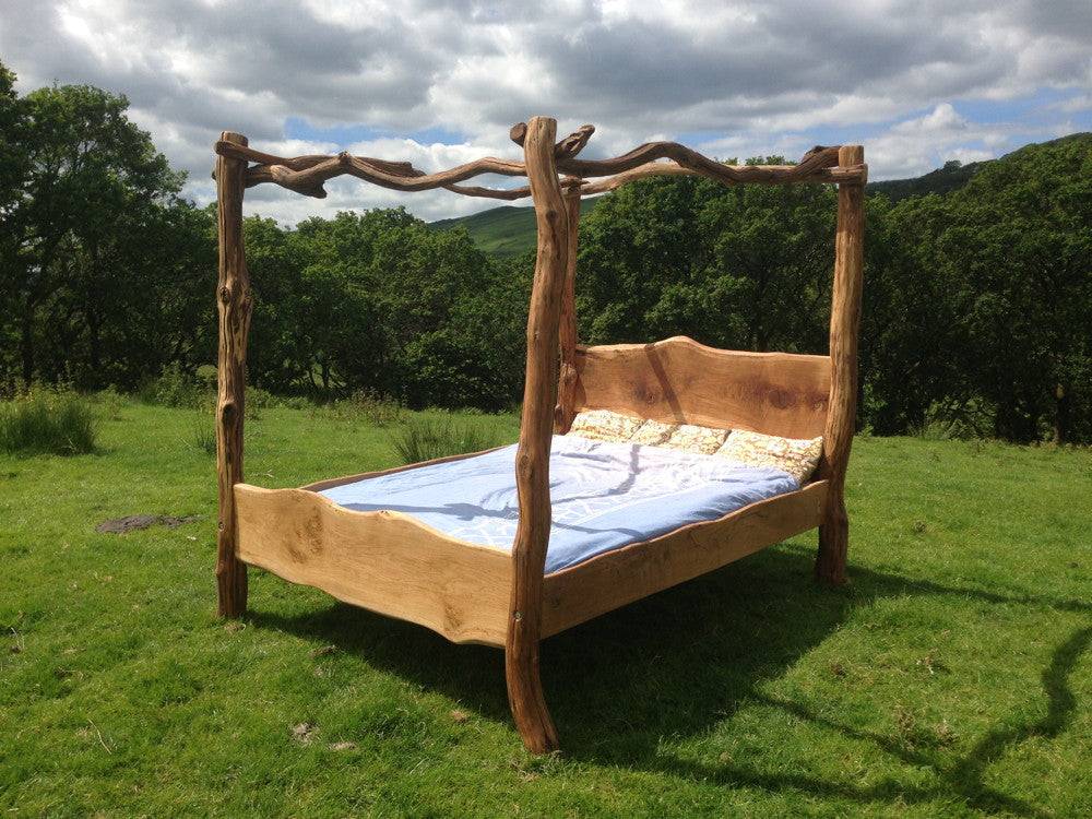 Rustic handmade oak four poster bed frame — bespoke tree bed, Wales