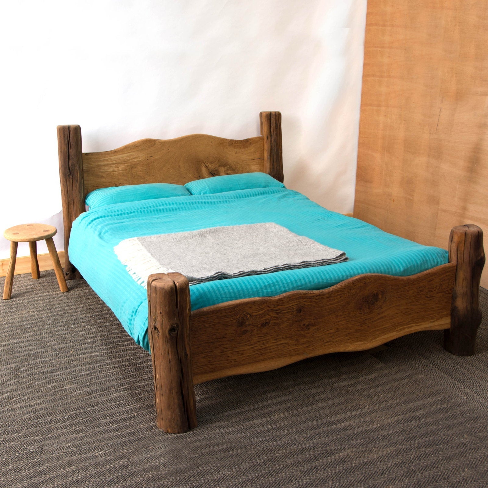 Rustic Solid Oak Bed Frame with hand-carved headboard and sustainable oak wood design