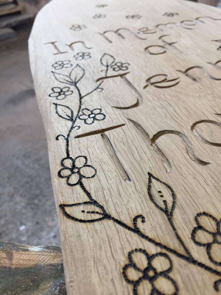 Personalised engraving on handmade carved oak storytelling chair — bespoke school reading throne, Wales