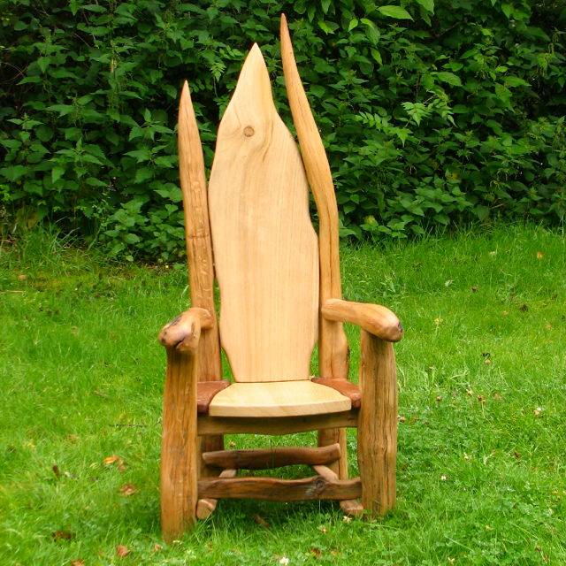 Hand-carved oak storytelling chair for school EYFS area — handmade in Mid Wales