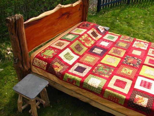 Handmade rustic yew bed — bespoke carved natural yew and oak, Wales