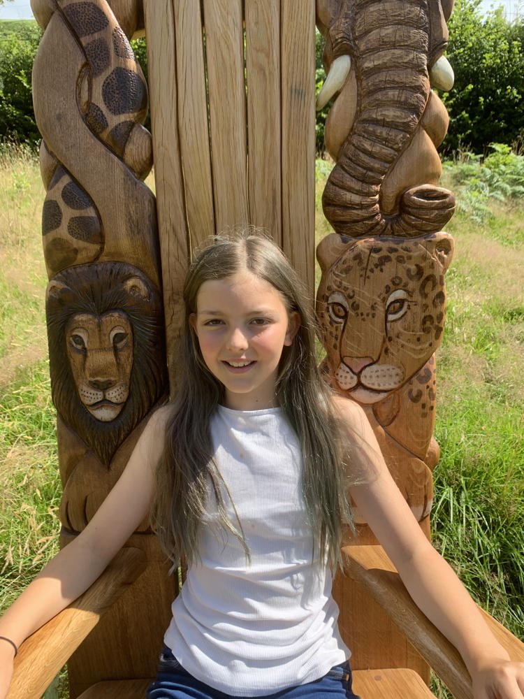Handmade carved oak safari storytelling chair — African animal throne for schools, Wales