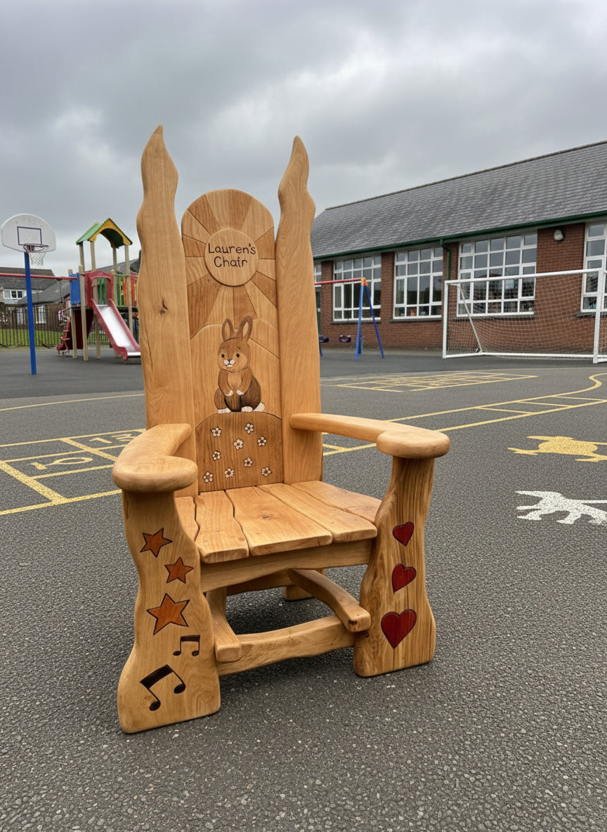 Handmade wooden children's reading chair with bunny design outdoors — bespoke, Wales