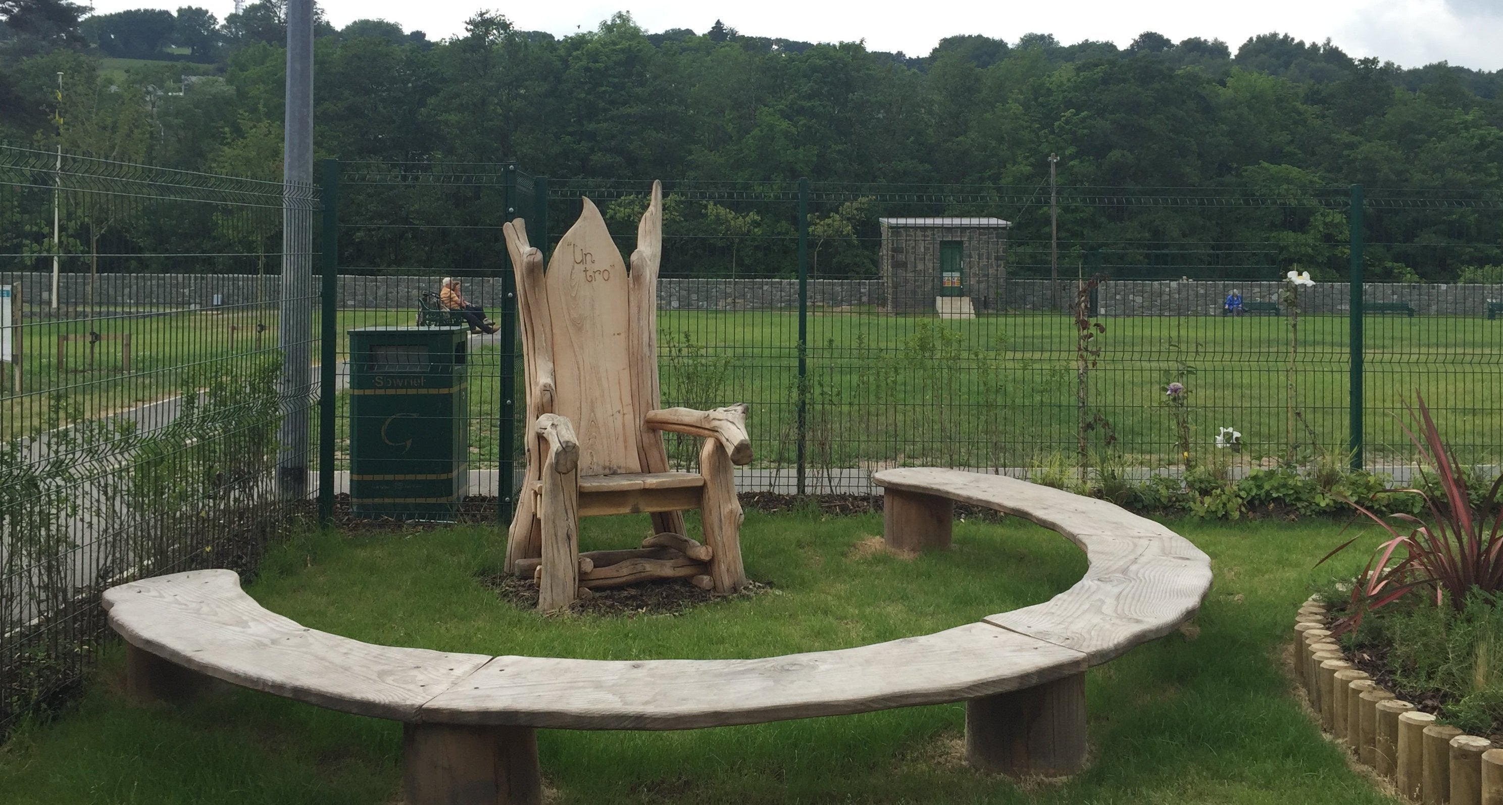 circular wooden bench in school playground