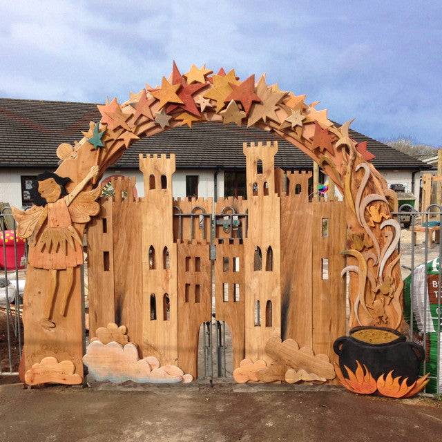 School storytelling arch — handmade carved oak archway for school playgrounds, Wales