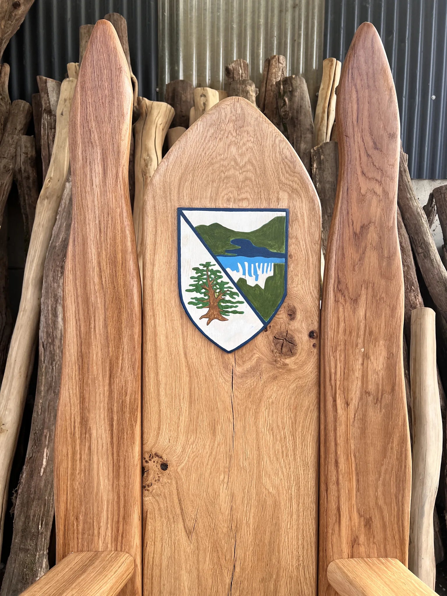 Close-up of the Rhayader Church in Wales Primary School tree and lake crest on a storytelling chair