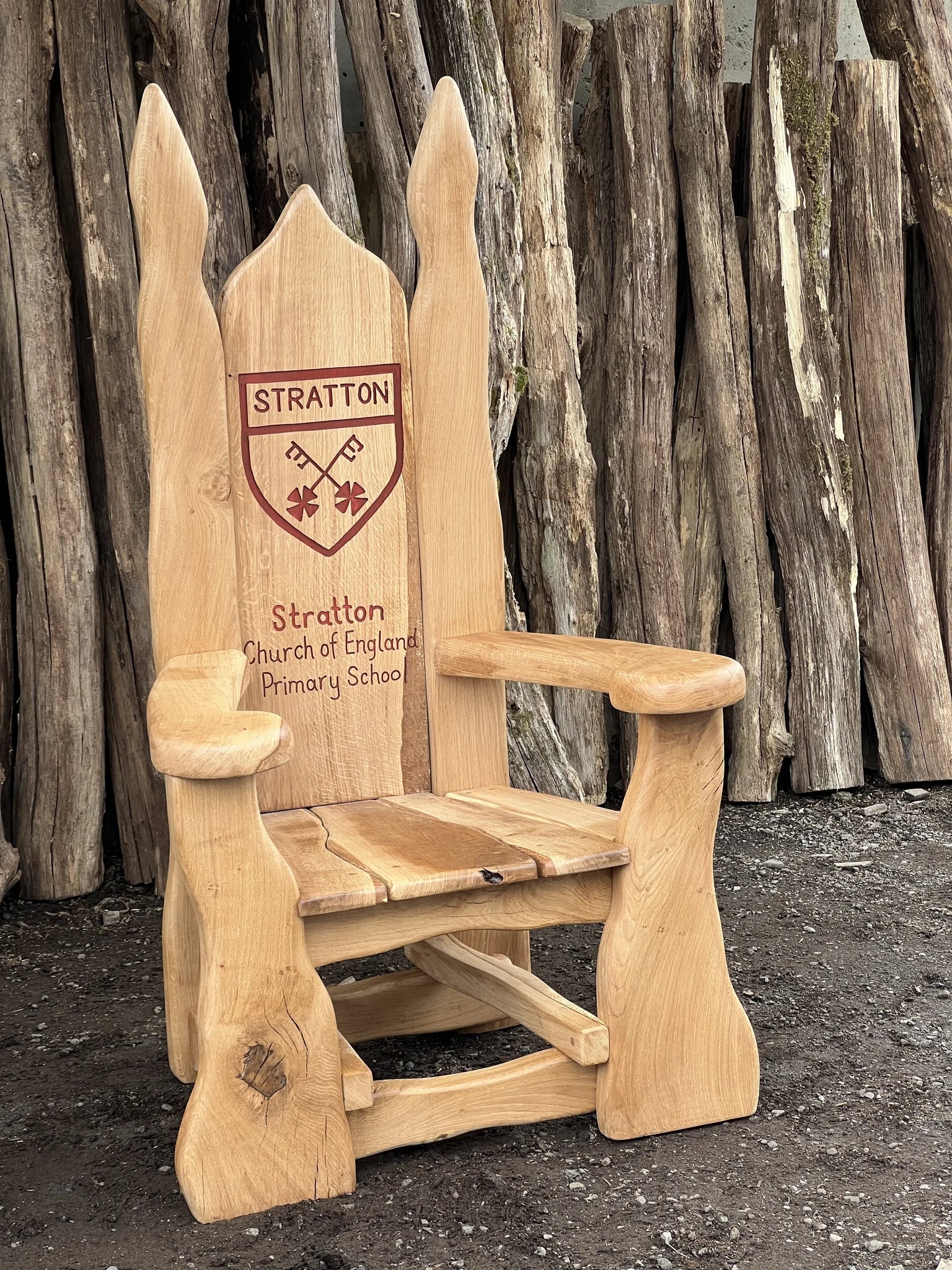 Bespoke Stratton Church of England Primary School storytelling chair, hand-carved in solid oak