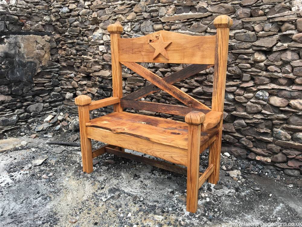 Handmade carved oak garden bench — bespoke outdoor seating, Wales