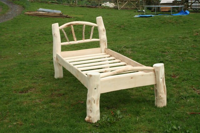 Handmade driftwood single bed for children — natural rustic wood, bespoke, Wales